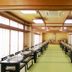 Hotel Matsukaze in Toyota: tatami banquet room with long dining tables and shoji-style windows