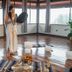 Villa Blanca Cloud Forest Hotel + Retreat in San Ramón meditation session in a bright wood-floored room