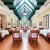 Mercure Grand Hotel Biedermeier Wien restaurant in Vienna with skylit atrium and set tables