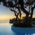 Boutique Hotel Torre Di Cala Piccola infinity pool at sunset in Monte Argentario with sea horizon