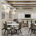 Residence Inn by Marriott Chicago Naperville/Warrenville breakfast area with tables and wall-mounted TV