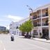 Cours Chabrol A Heritage Hotel By The Sea in Pondicherry, street view of white seaside hotel