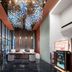 Haobo International Hotel in Wuxi lobby with sparkling chandelier and floor-to-ceiling windows