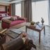 Hotel Del Sole, Pompei: guest room with king bed, sofa, desk and large window with curtains