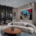 Four Points by Sheraton Izmir lobby with curved sofas, round coffee table, and modern art wall