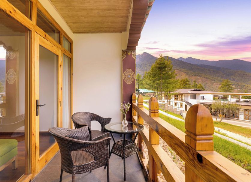 Lemon Tree Resort, Thimphu, Bhutan balcony with seating and mountain valley view