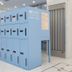 Toyoko Inn Nagoya Sakae in Nagoya features a large blue luggage locker area in the lobby.