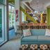 Hotel Indigo Asheville Downtown By IHG lobby seating area with sofa and colorful modern decor in Asheville