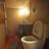 Baia Baia Resort in Ko Phi Phi bathroom with toilet, sink and tiled shower area