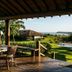 Pousada Outeiro in Trancoso with deck seating, lawn, pool and ocean view