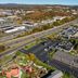 Quality Inn Wayne - Fairfield Area in Wayne, aerial view of parking lot, road, and surrounding trees