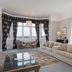 The Welcombe Hotel, Stratford-upon-Avon: elegant lounge with beige sofas, bay windows and garden views