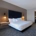 Fairfield by Marriott Inn & Suites Denver Airport at Gateway Park guest room with king bed and desk