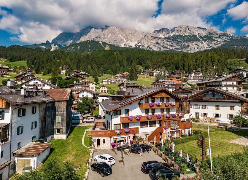Hotel da Beppe Sello in Cortina d'Ampezzo with village rooftops and mountain backdrop