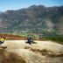Skarsnuten Mountain Resort & Spa in Hemsedal overlooking mountain bikers on a scenic downhill trail