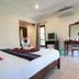 Lanta White Rock room in Ko Lanta with king bed, vanity table, TV, and air conditioning