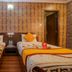 OYO 11457 Kathmandu Resort Hotel in Kathmandu twin bed guest room with patterned walls