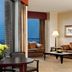 Sheraton Atlanta Airport Hotel in Atlanta room with runway view, leather seating, and lamp-lit lounge area