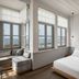 Ambassadors Residence Boutique Hotel, Chania: bright room with bed, seating nook, and sea-view windows