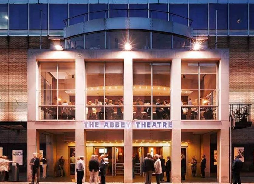 Wynn's Hotel in Dublin exterior with the Abbey Theatre entrance and people gathered outside