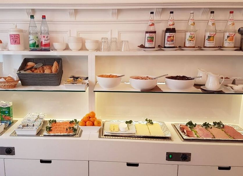 Cristall Frankfurt am Main hotel breakfast buffet with pastries, fruit, cold cuts and yogurt