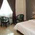 Jb City Hotel Johor Bahru guest room with double bed, window seating and curtains