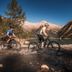 Hotel Jägerhof Mayrhofen cyclists by alpine lake with mountain views in Mayrhofen
