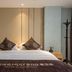 Yong Cun Hotel (Xi'an Bell Tower) in Xi'an, guest room with king bed and bedside lamps