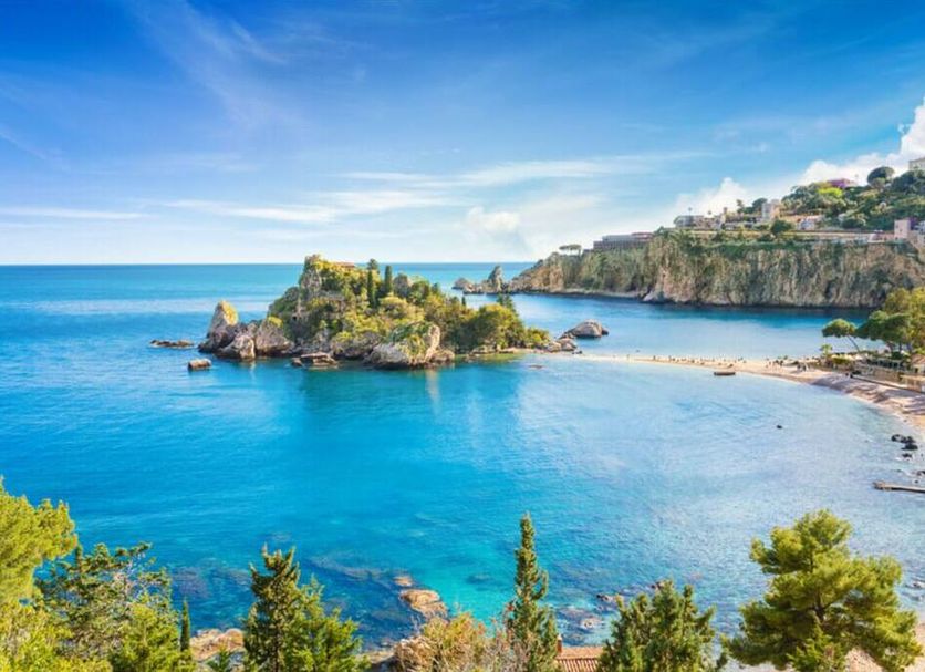 B&B Boutique di Charme Etna-Relax-Natura in Zafferana Etnea with a scenic coastal bay and clear blue sea