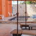 Hotel Boutique Plaza Doradas in San José del Cabo features a small outdoor pool and lounge chairs