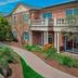 Residence Inn by Marriott West Orange exterior with brick facade, balcony, and landscaped walkway