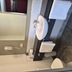 Landmark Manor Motel in New Plymouth bathroom with vanity sink, mirror and wall-mounted towels