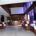Hotel City Tower Coimbatore lobby with leather seating and reception desk in a modern interior