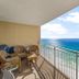 Balcony at Emerald Beach Resort, Panama City Beach, with chairs and sweeping ocean view