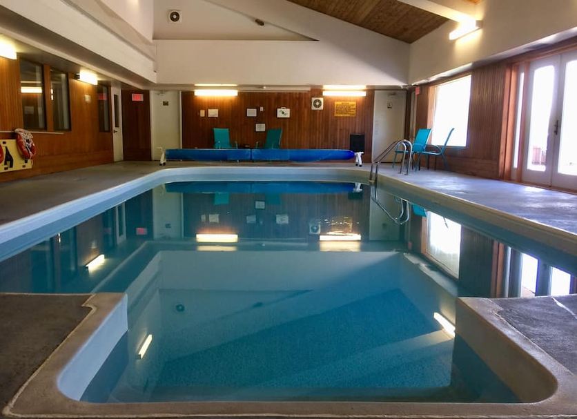 The Ashwood Inn, Bluewater indoor pool with hot tub and lounge chairs