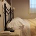 Guest room at Grand Hotel Lamezia in Lamezia Terme with a neatly made bed and window view