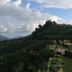 Mon Ing Dao in Mae Rim with lush terraced hillsides and a cloudy mountain view