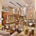 Cape Town Marriott Hotel Crystal Towers lobby with lounge seating, high ceilings and warm wood accents in Cape Town