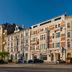 Hotel Vision Budapest by Continental Group in Budapest, street view of historic facade with tram