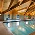 Best Western Northwoods Lodge indoor pool with wood-beamed ceiling in Siren