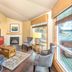 Worldmark Deer Harbor living room with fireplace, large windows and harbor view