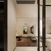 Bo Xuan Hotel (Beijing Yungang Nangong) room interior with glass partition and seating area in Beijing