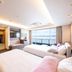 Hotel Biwanso in Nanao guest room with twin beds and ocean view through large windows