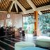 Fullmoon Villa Ubud in Ubud: open-air lobby with wood-beamed ceiling and lounge seating