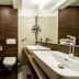 Hotel Blanca Resort & Spa in Šišava bathroom with double sinks, bidet, toilet, and bathtub