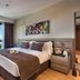 Fraser Place Antasya Istanbul guest room with city view, king bed and large window in Istanbul