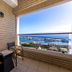 Fullon Hotel Hualien balcony with chairs and harbor view in Hualien City