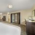 Best Western Black Hills Lodge in Spearfish guest room with king bed, desk, TV and open closet
