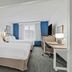 Spark by Hilton Mechanicsburg Harrisburg West guest room with two beds, desk, TV and window seating