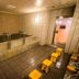 Super Hotel Inn Sendai Kokubuncho indoor hot bath with steps and small stools in Sendai
